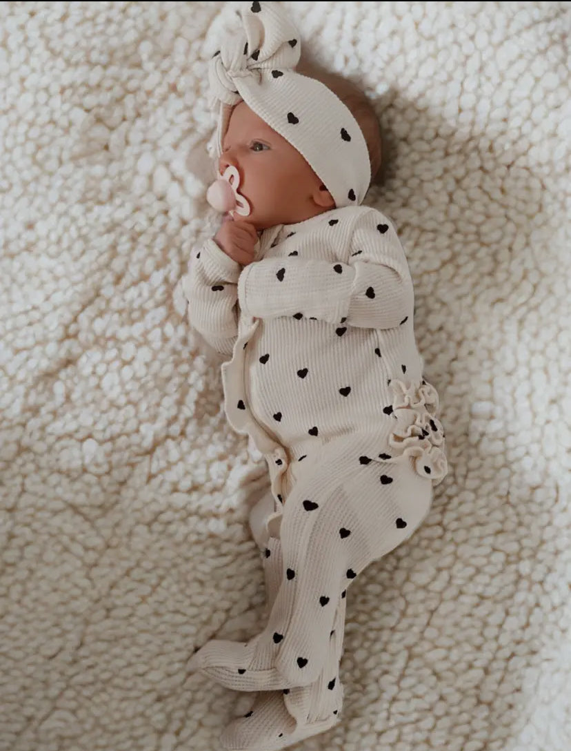 Organic Waffle 2-Way Zip Ruffle Onesie | Black Heart