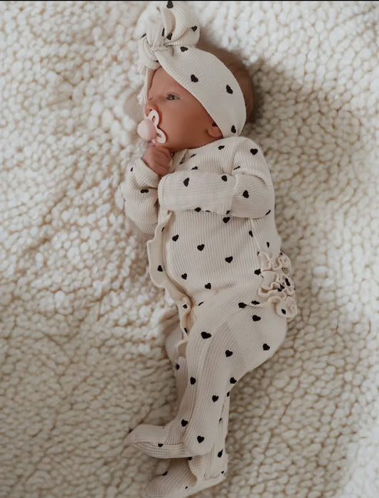 Organic Waffle 2-Way Zip Ruffle Onesie | Black Heart